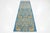This exquisite, handmade wool rug showcases a contemporary Arts and Crafts style, featuring a stunning floral design...