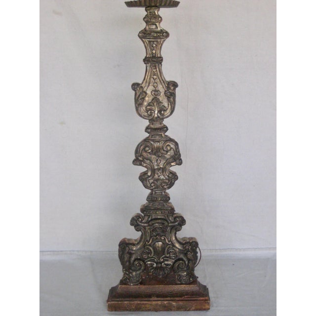 Beautiful Antique candlestick transform in lamp, made out of embossed silver-plate metal applied on wood, this technique...