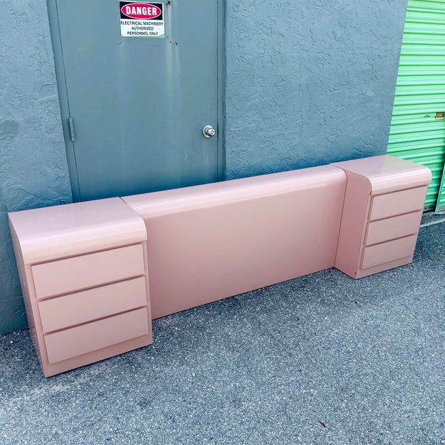 Nightstands: 13”w, 17.5”d, 30.25”h Headboard: 62”w, 7.5”d, 30.25”g This striking three-piece postmodern bedroom set...