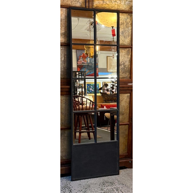 Design Plus Gallery presents a Full Length Mirror from Bid K Home. The Mirror has an eight rectangular windows arranged in...