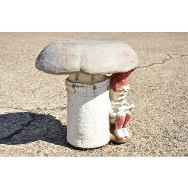 Vintage Cement Concrete Figural Elf under Mushroom Garden Stool Seat. Item features unique form with elf resting under...