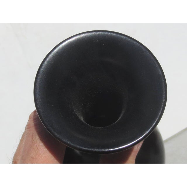 Beautiful, high-style Japanese Tokoname-ware vase. Hard red clay body in the tall bottle shape. matte glaze with bronze to...