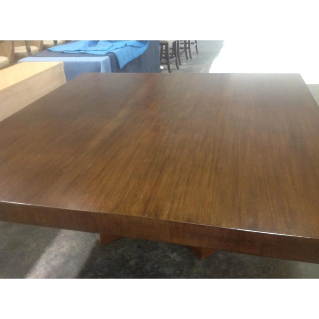 Modern square dining table . Table is 54’’ x 54’’ and 30’’ tall. Solid and made of alder. Table has a walnut finish. We...