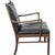 Ole Wanscher Colonial chair with a frame of lacquered mahogany and cushions upholstered in black leather. The chair is...