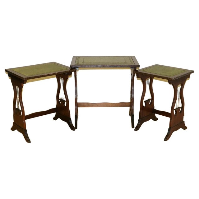We are delighted to offer for sale these lovely mahogany nest of tables green leather top tables. These good looking and...