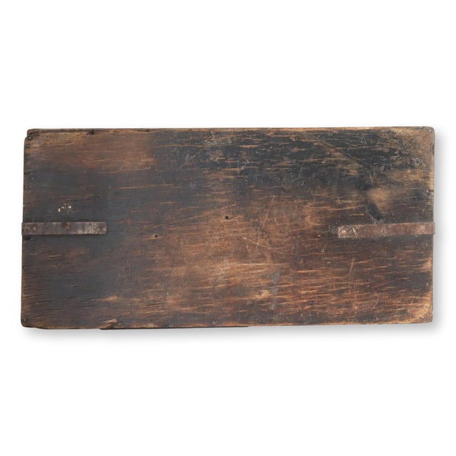 This antique tool caddy is a genuine piece of artisan history. Its sturdy wooden construction and time-earned patina speak...