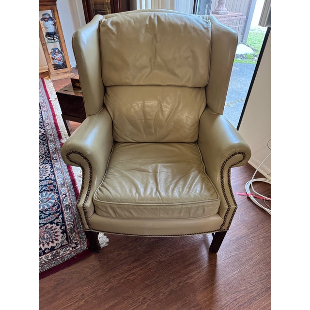 This premium vintage armchair from Classic Leather Inc. perfectly balances sophisticated traditional design with...