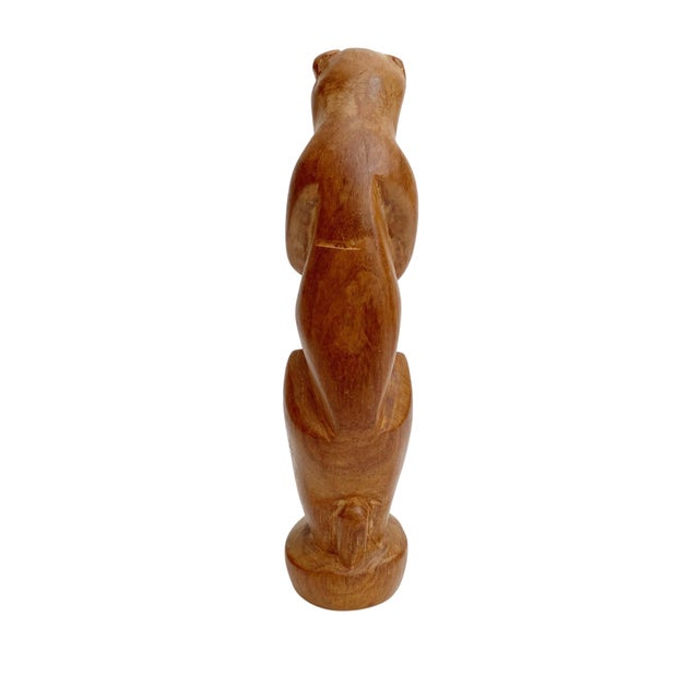 Introducing the Carved Wooden Monkey MCM - See No Evil, a stunning handcrafted statue that embodies the timeless wisdom of...