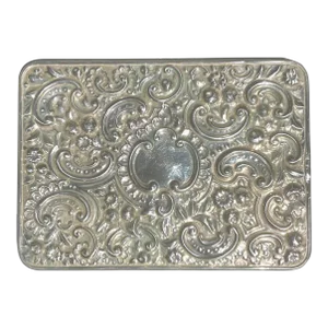 Antique Edwardian Repousse Sterling Silver Bevelled Edge Mirror.