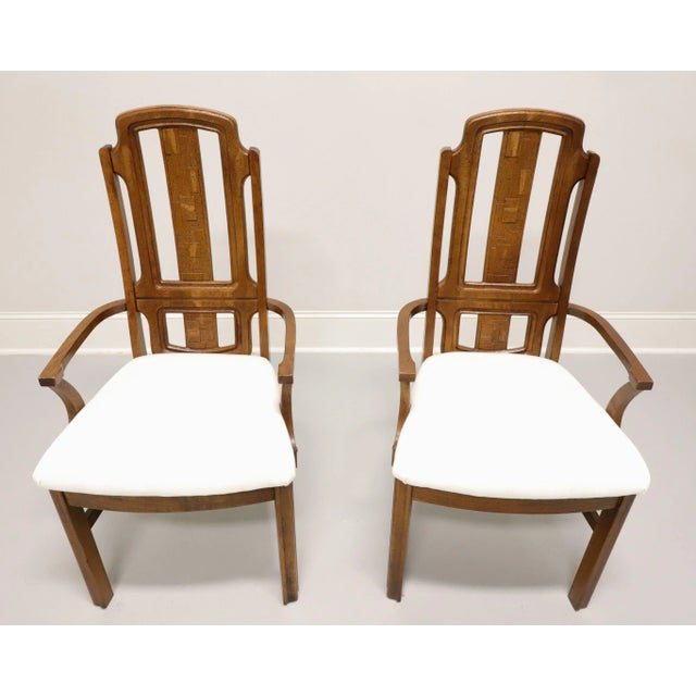 A pair of Mid 20th Century Brutalist style dining armchairs by Broyhill Premier. Oak with slightly distressed finish,...