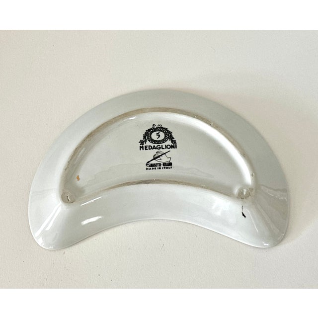 Single Medaglioni Piero Fornasetti Gilt Porcelain Cresent Shaped Catchall Tray For Sale - Image 12 of 12