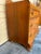 Vintage Art Deco Waterfall Dresser With an Attached Arched Mirror Featuring Amber-Tinted Glass Panels and Geometric Wood Inlay on Casters For Sale - Image 10 of 12