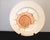 These 4 plates are by Fitz and Floyd in Japan circa. 1977 thru to 1992. The pattern is Coquille, Which is a peach color...