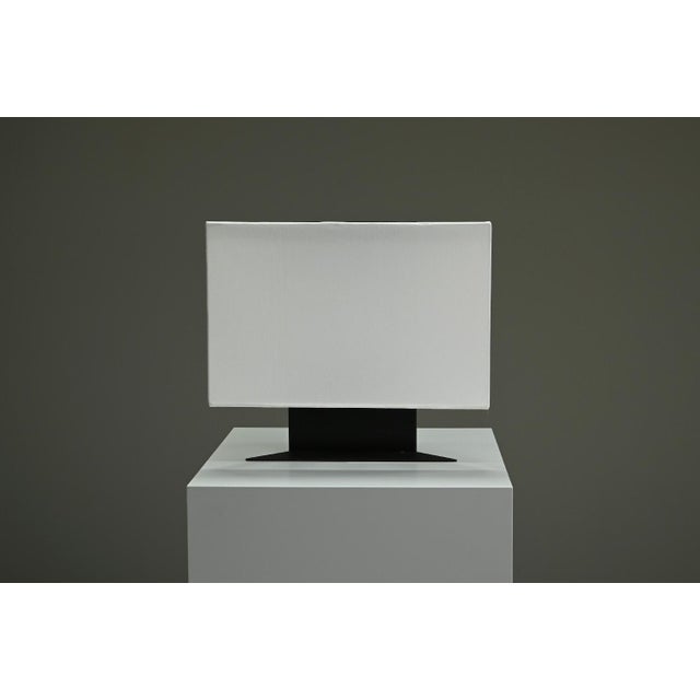 Accademia table lamp from Cini Boeri for Artemide, 1970s Italy. Elevate your interior with the minimalist elegance of the...