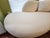 Beautiful matched pair of circa-2000s Weiman sculptural chaise sofas in their original ivory/cream upholstery. Each sofa...