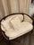 French Louis XV/Rococo Revival or Victorian style. It features an ornate dark carved wood frame, cabriole-style legs, and...