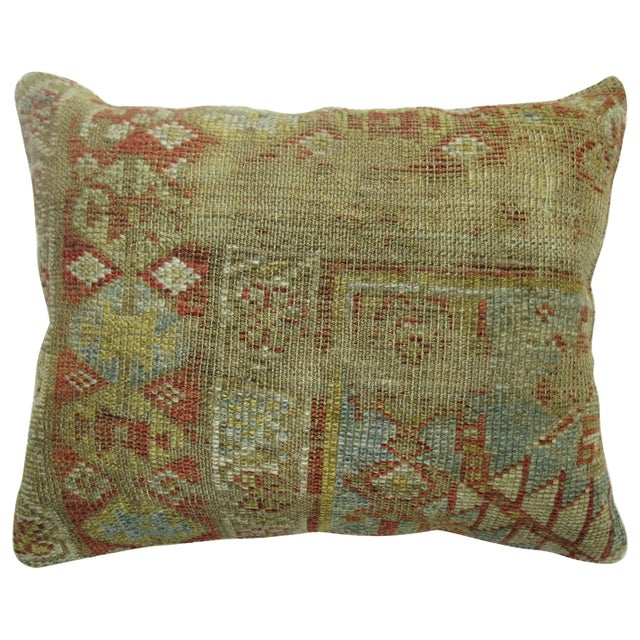 Pillow made from a Persian Malayer rug in dominant light blue and rust accents. Measures: 15" x 20".