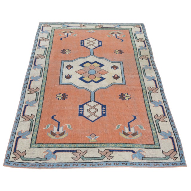 Vintage Turkish Anatolian hand knotted rug with natural colors, contemporary style and soft texture.