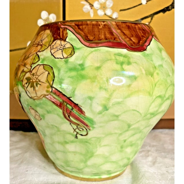 CAn exceptional and highly collectible piece of vintage British art pottery, this vibrant vase was produced by Royal...