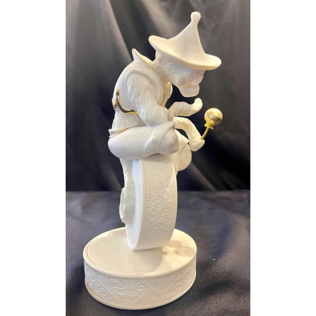 Biscuit porcelain by Jean Boggio by Franz. This pictorial genre shows a monkey imitating human behavior. He is dressed in...