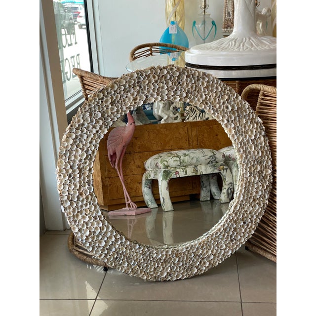 Lovely vintage round shell seashell wall mirror. Comes ready to hang. The mirror portion will be replaced with a new...