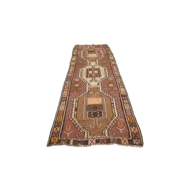Handwoven vintage kilim rug from Kars region of Turkey. Approximately 50-60 years old. In very good condition.