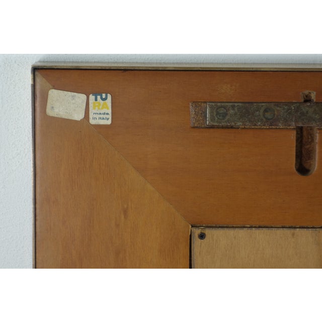 This is a vintage square wall mirror designed by Aldo Tura, renowned for his innovative use of luxurious materials and...