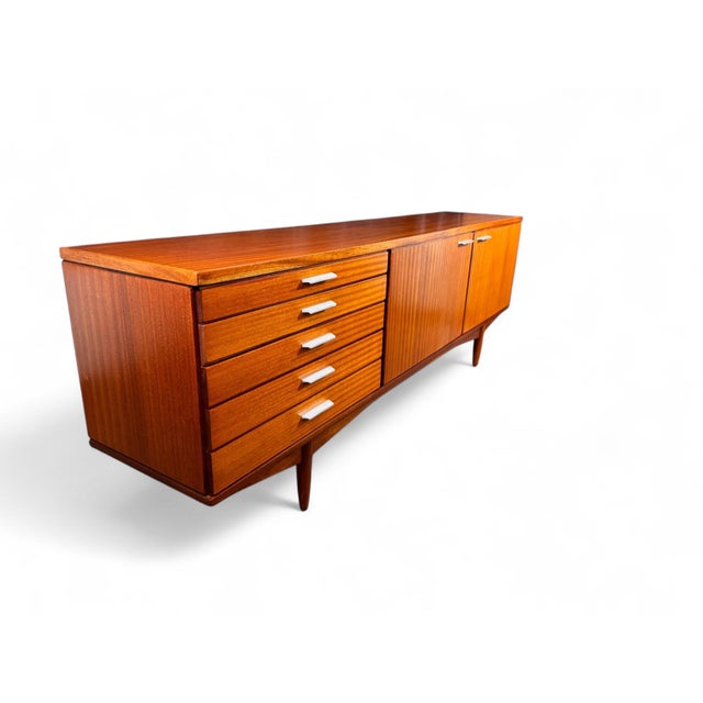 Presented is a rare sideboard by White & Newton, this is the Rimington model, designed by Arthur Edwards in the 1960s....
