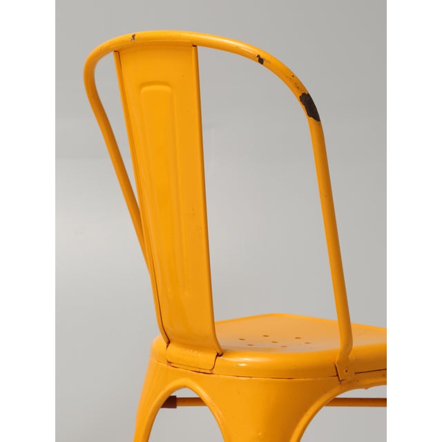Yellow tolix chair discount