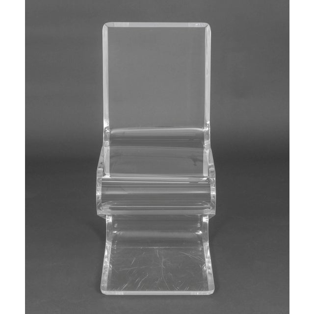 Mid-Century Modern Style Clear Acrylic "Z" Side Chair, with beveled edges. 34.5" H x 16" W x 20.5" D; seat: 18" H....