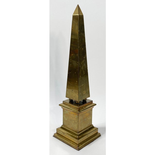 Vintage large statement vintage brass obelisk. Statement-making scale at 22.25"H. Nice detail with a 6" square base. Age...