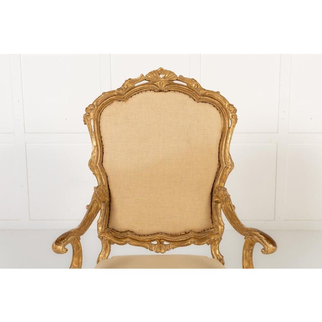 18th century italian rococo carved giltwood armchair of northern italian origin, most likely venetian, this chair is a...