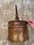 This antique handcrafted copper bucket features unique riveted dovetail details, making it a special addition to any...