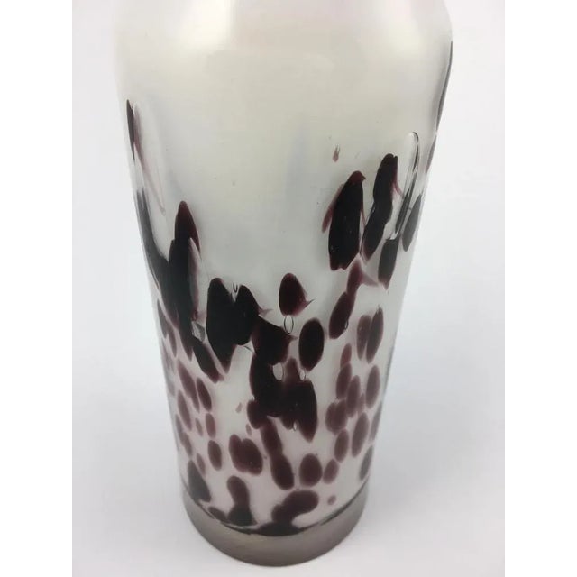 Mid-century glass vase with dotted coating. On white glass base with a polka dot pattern, bottle shaped glass vaze, in...