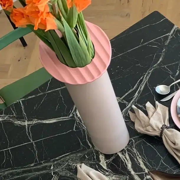 Gargantuan pink Memphis Milano style cylindrical ikebana vase with squiggle collar. Signed by artist Masa Mami. One flaw...