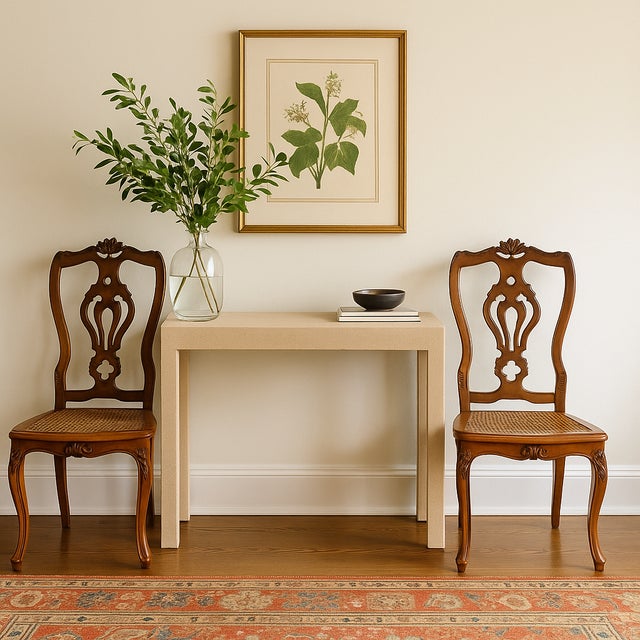 This authentic pair of antique Italian side chairs features exquisite hand-carved detailing, elegant cabriole legs, and...