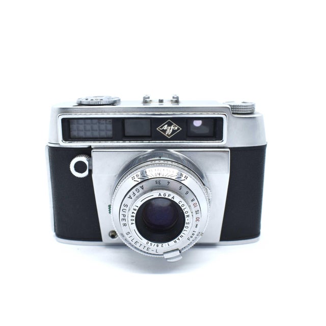 Capture the essence of mid-century German engineering with this vintage Agfa Super Silette-L 35mm rangefinder camera....