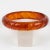 Art Deco Bakelite Carved Bracelet Bangle Translucent Red Tea Amber Marble For Sale - Image 3 of 4