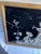 A single rectangular antique English tinsel painting on glass featuring a Chinese court scene including a pagoda, figures,...