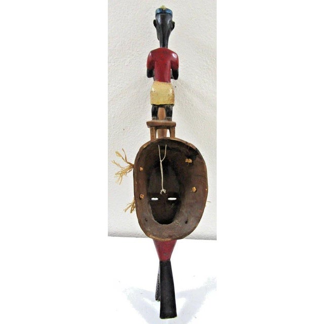 Antique Hand-Carved Guro Mask of the Ivory Coast Featuring a Seated Figure For Sale - Image 15 of 15