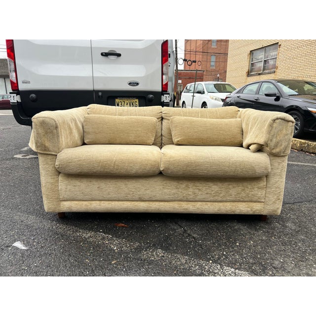 This versatile sleeper loveseat sofa featuring soft neutral upholstery and a clean, comfortable silhouette. The plush...