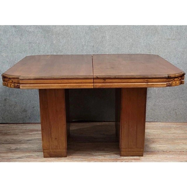 Art Deco mahogany extending table, circa 1925 Carved decoration Unusual base Sold without extensions H 77 x W 128 x D 115...