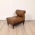 A Victorian/Edwardian adjustable gout stool, made of mahogany and upholstered in leather.