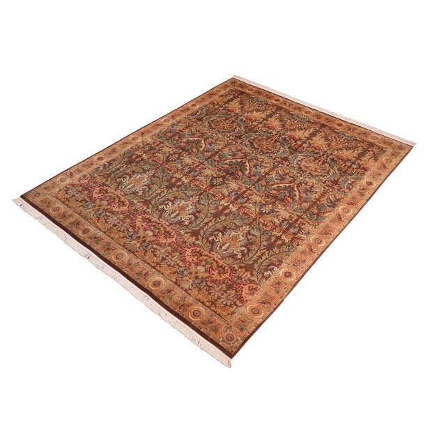 Designed with mesmerizing intricacy and gorgeous color palette, this hand-knotted masterpiece demonstrates the beauty and...