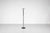 The "Tucano" coat rack consists of a sturdy black metal base and five height-adjustable arms. One of the arms is stuck at...