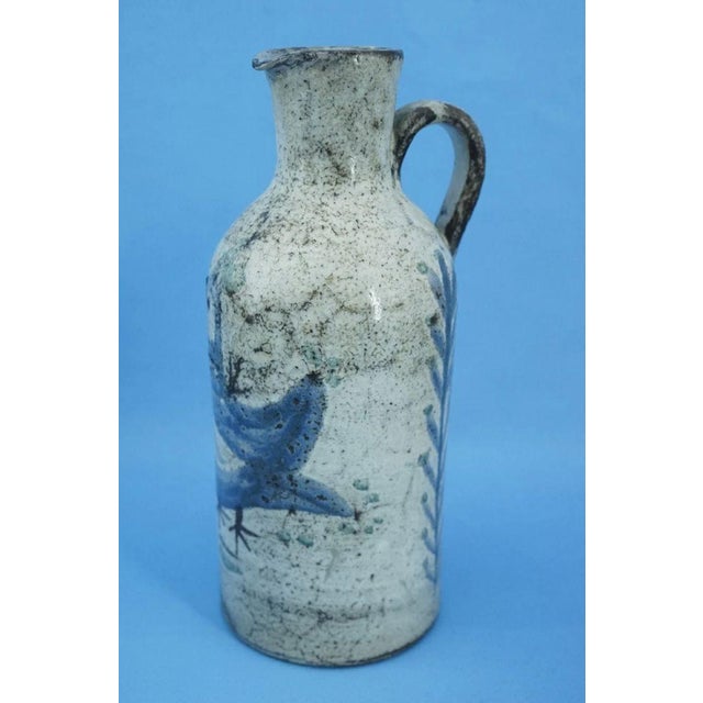 MEASUREMENTS: Height: 24 cm; Width: 11.5 cm; Depth: 10 cm; Weight: 0.936 kg Item : A splendid cylindrical jug,...