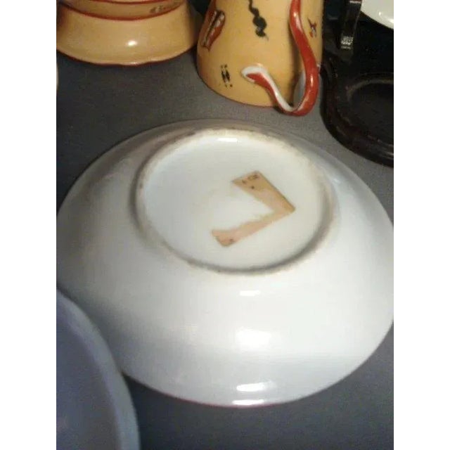 Antique Old Paris Tea Service comprising a tea pot and cover, creamer jug, covered sugar bowl, cup and two saucers....