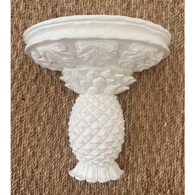 Carved white lacquered wall bracket. Semicircle area measures 9"x5".