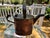 Charming vintage brass watering can with a very nice patina. This useful piece features a classic cylindrical form,...