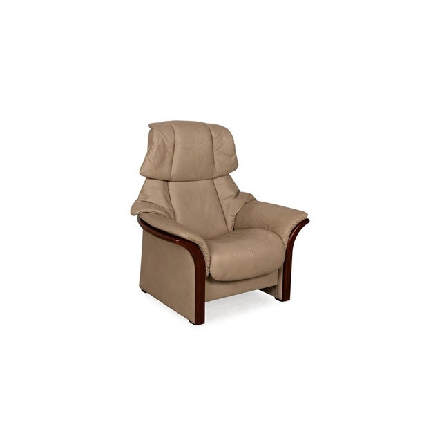 The Eldorado armchair from Stressless is covered in beige genuine leather and has floor-to-ceiling armrests. The elegant...